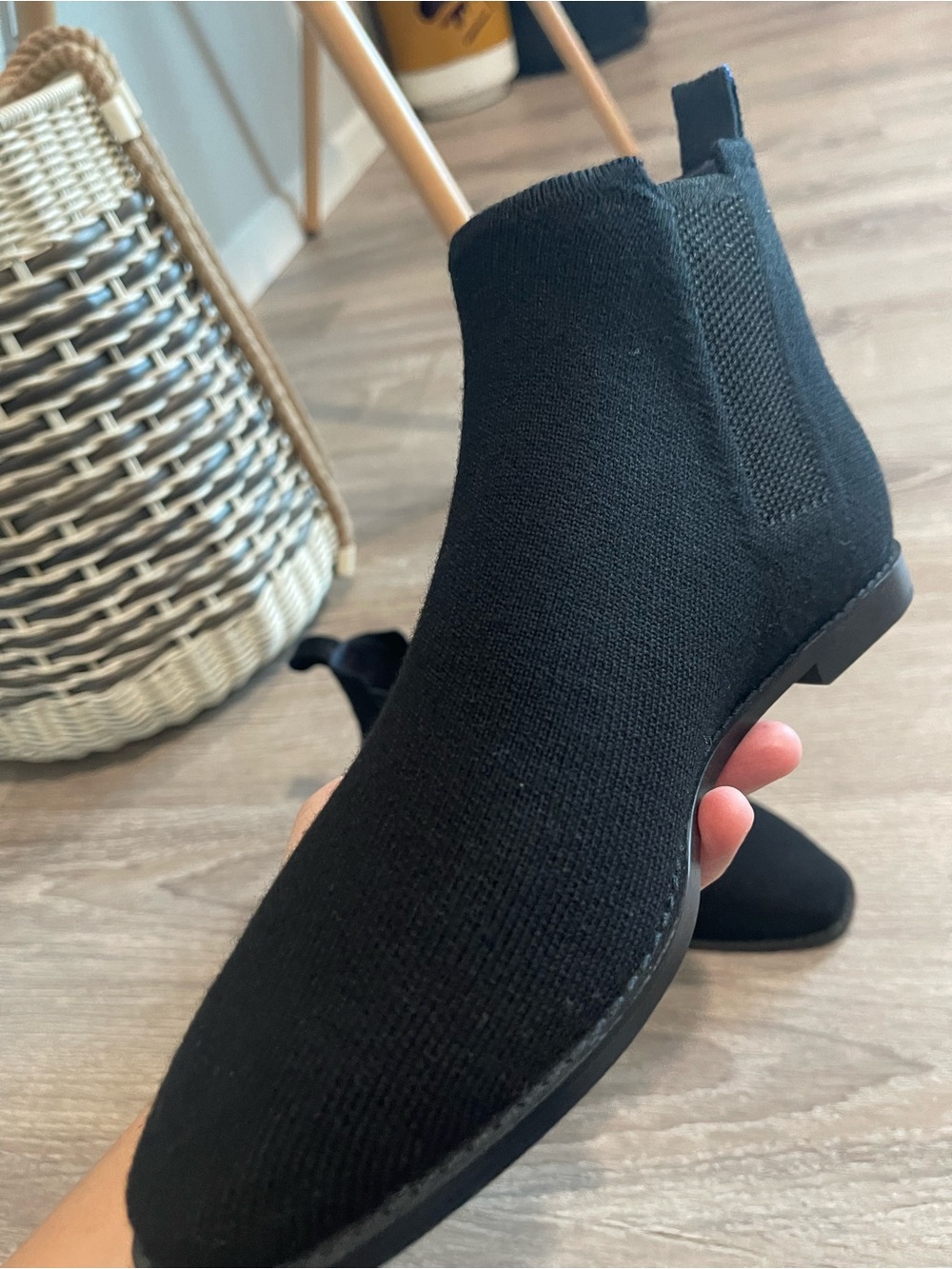 Rothy’s Merino Ankle Boots in onyx black with a distinctive blue pull tab - Picture 7 of 13